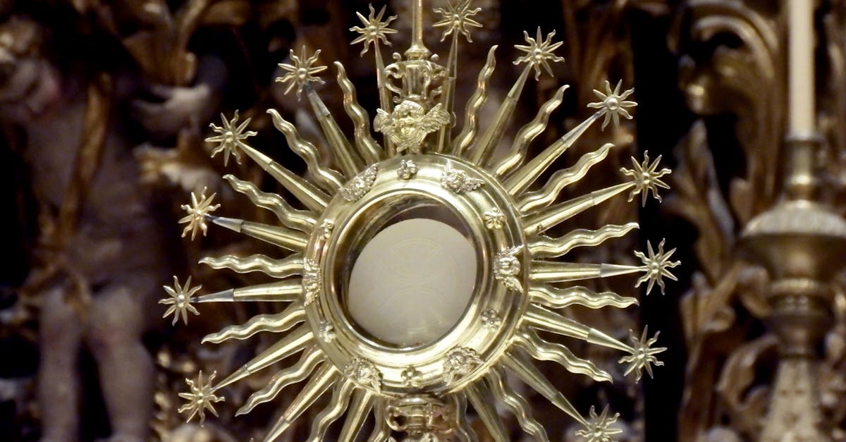 An ornate gold monstrance capturing religious and cultural significance in exquisite detail.